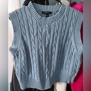 Powdered blue sleeveless sweater